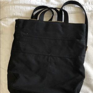 Black canvas convertible title/backpack